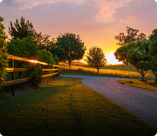 Sunset over a peaceful rural landscape.